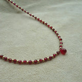 COLLAR GOTA GRANATE