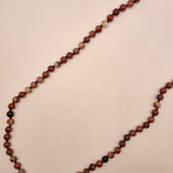 COLLAR ANUDADO PIEDRAS