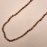 COLLAR ANUDADO PIEDRAS